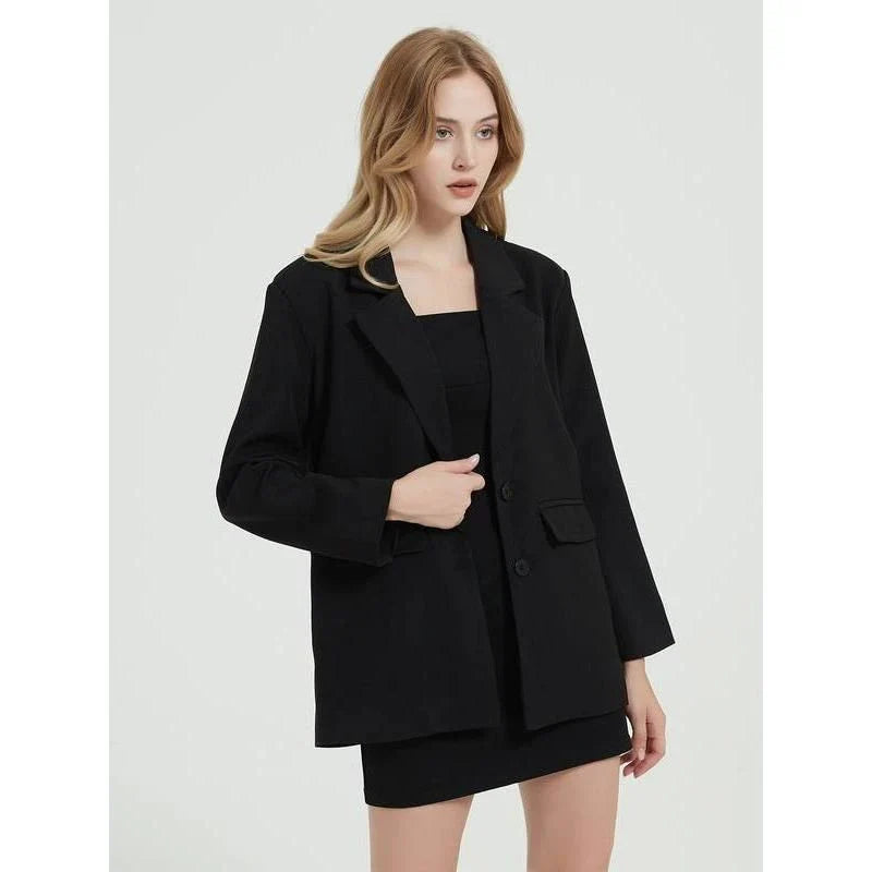 Elegant women's black blazer coat with a turn-down collar, single-breasted closure, and practical pockets for a polished, professional look.