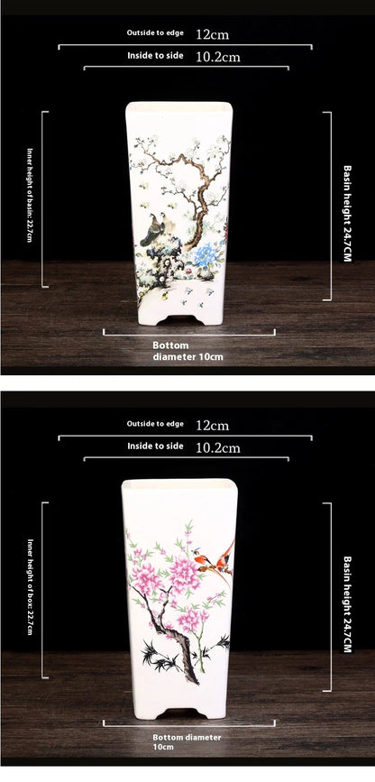 Elegant square ceramic planter in white with a Chinese-inspired design, suitable for indoor plants like asparagus fern and orchid.