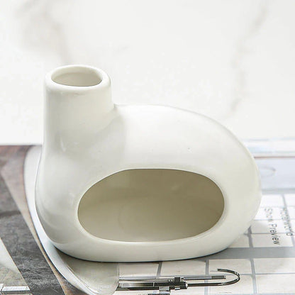 Elegant ceramic Palo Santo incense burner with a modern, conical design for optimal aroma release