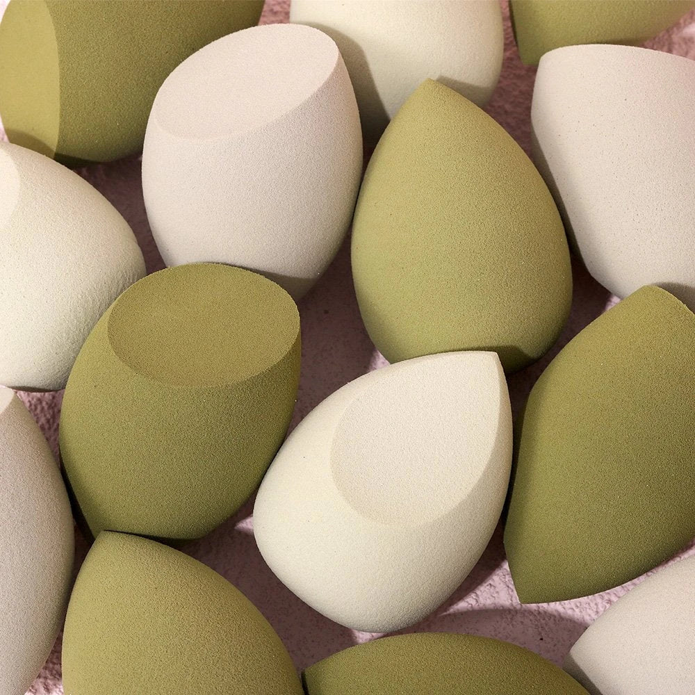 4-piece set of soft, pink makeup sponges for flawless foundation, concealer, and contour application