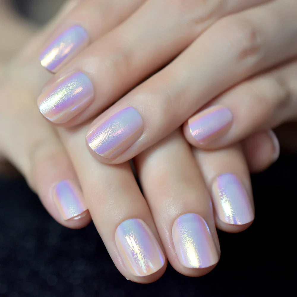 Chrome iridescent press-on nails with short round glossy tips, offering a dazzling, salon-quality manicure at home