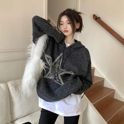 A cozy, vintage-inspired sweater with a five-pointed star design, made in America with premium polyester for lasting comfort and style.