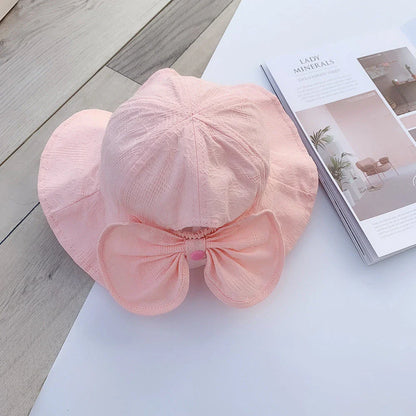 Adorable princess-inspired baby bucket hat with soft cotton material and wide brim for sun protection