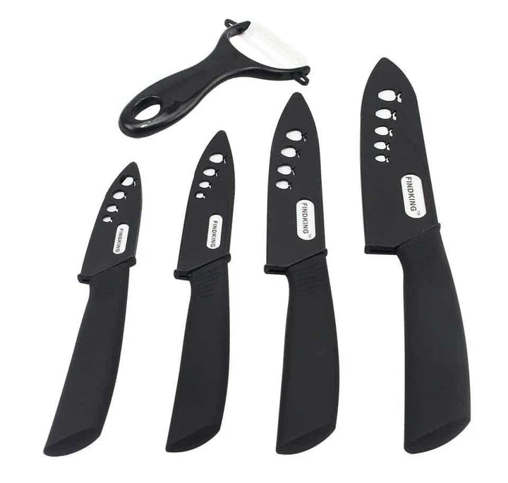 Vibrant ceramic knives in various colors, including red, blue, green, black, yellow, and orange, arranged on a white background.
