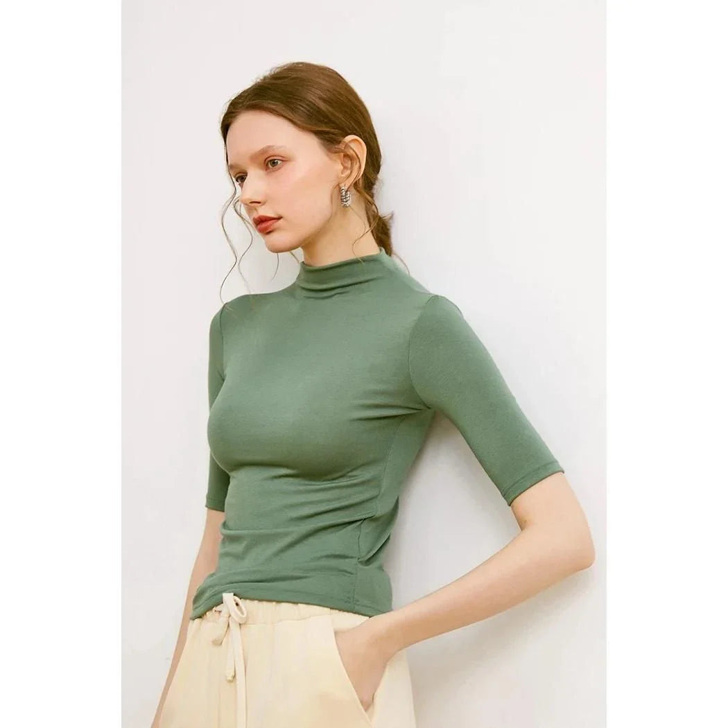 Women's Mock Neck Wool Blend T-Shirt in Pink by Trendha, featuring a sleek silhouette and classic design for elegant, comfortable wear.