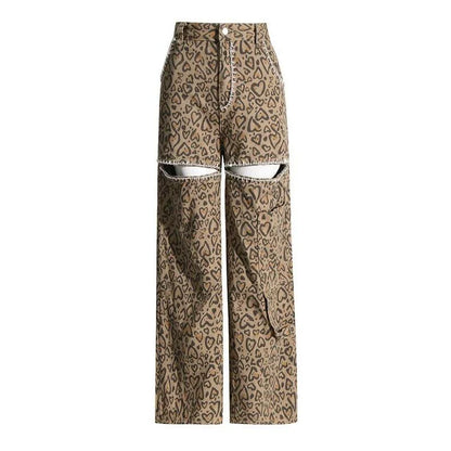 Chic high-waisted patchwork leopard print denim trousers with rivet details and wide-leg silhouette