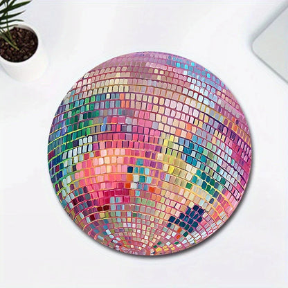 Dazzling pink disco ball-patterned mouse pad with a smooth, rubber surface and non-slip base for a stylish and functional desk accessory.