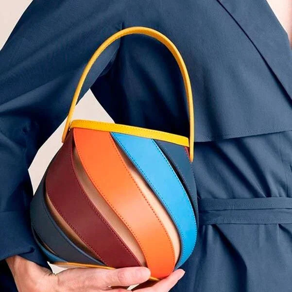 Colorful striped PU leather bucket handbag with adjustable strap and roomy interior