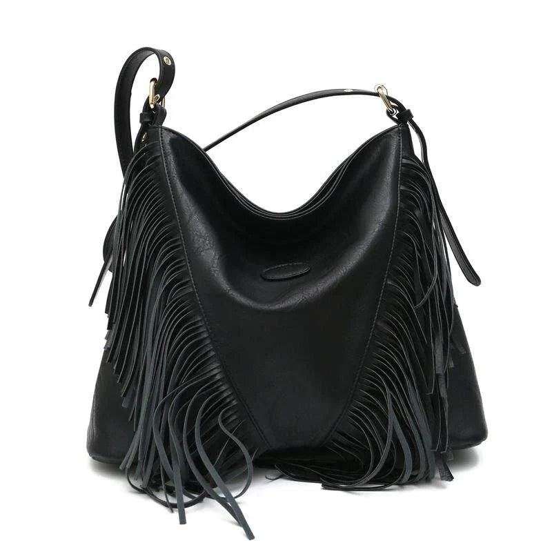Chic vegan leather shoulder bag with tassel decoration, featuring a spacious interior and versatile carrying options