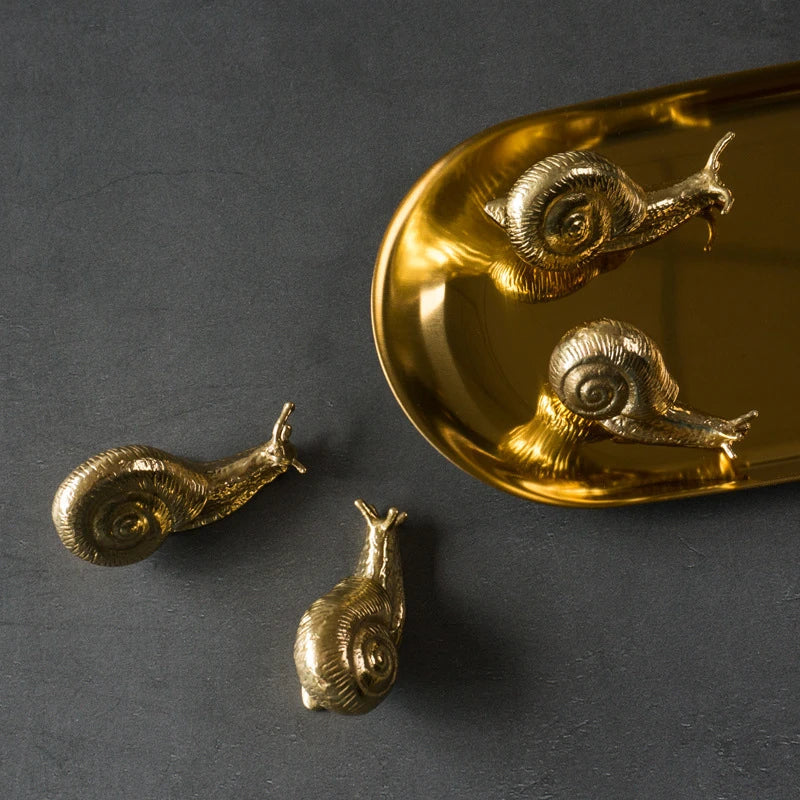 Elegant European-style retro brass snail cabinet door handles with a vintage-inspired design