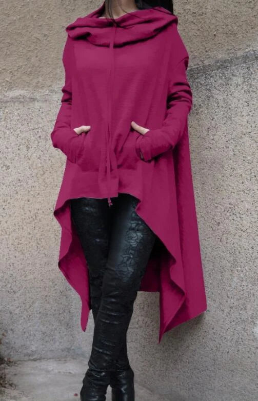 A cozy, loose-fit hooded sweatshirt in a stylish dark grey color, perfect for staying warm and comfortable during the fall and winter seasons.