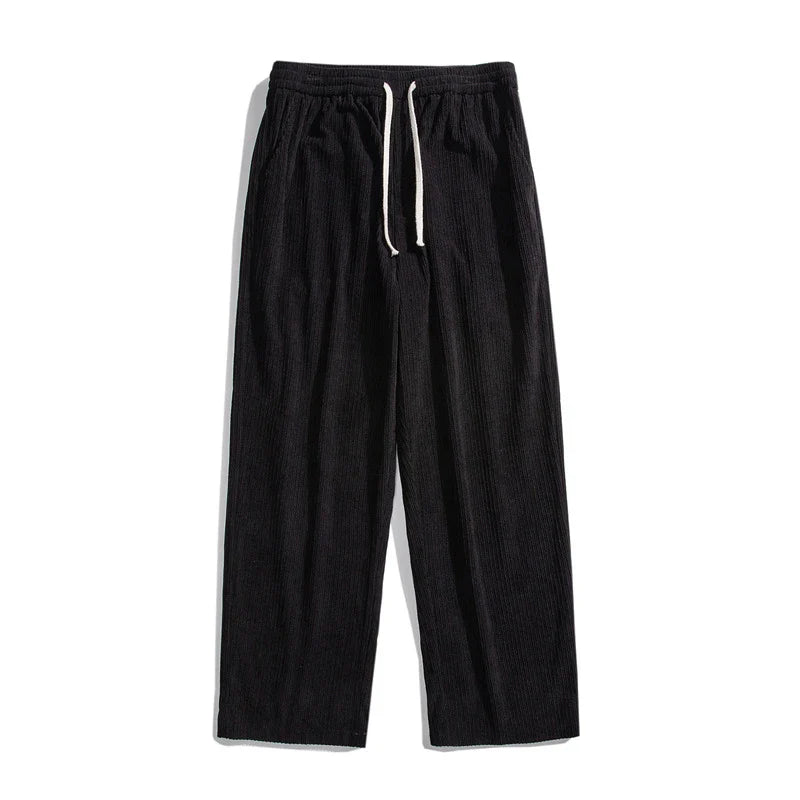 Fleece-lined corduroy pants in various colors, featuring a relaxed, straight-leg fit for all-day comfort and warmth.