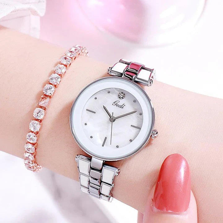 Elegant steel-strap women's watch with minimalist design and quartz movement for timeless style and reliable performance