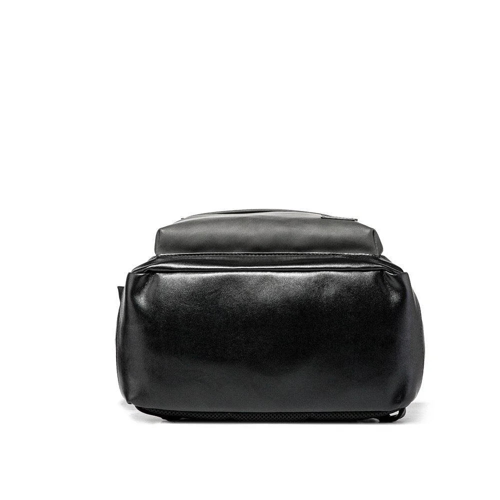 A large, high-quality PU leather backpack with a sleek, modern design and ample storage capacity