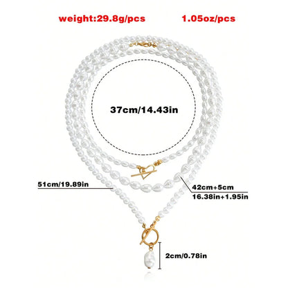 Elegant imitation pearl heart pendant necklace with lustrous bead chain and secure OT buckle closure