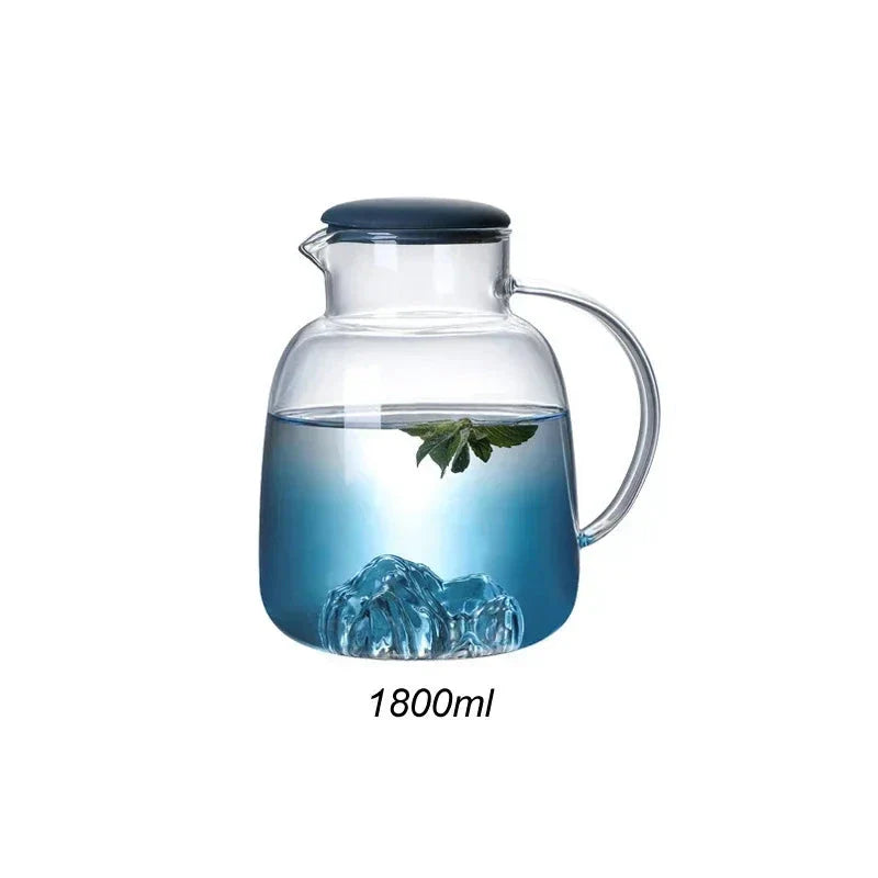 Mountain Gradient Glass Pitcher with a 1800ml capacity and ergonomic handle for serving hot and cold beverages