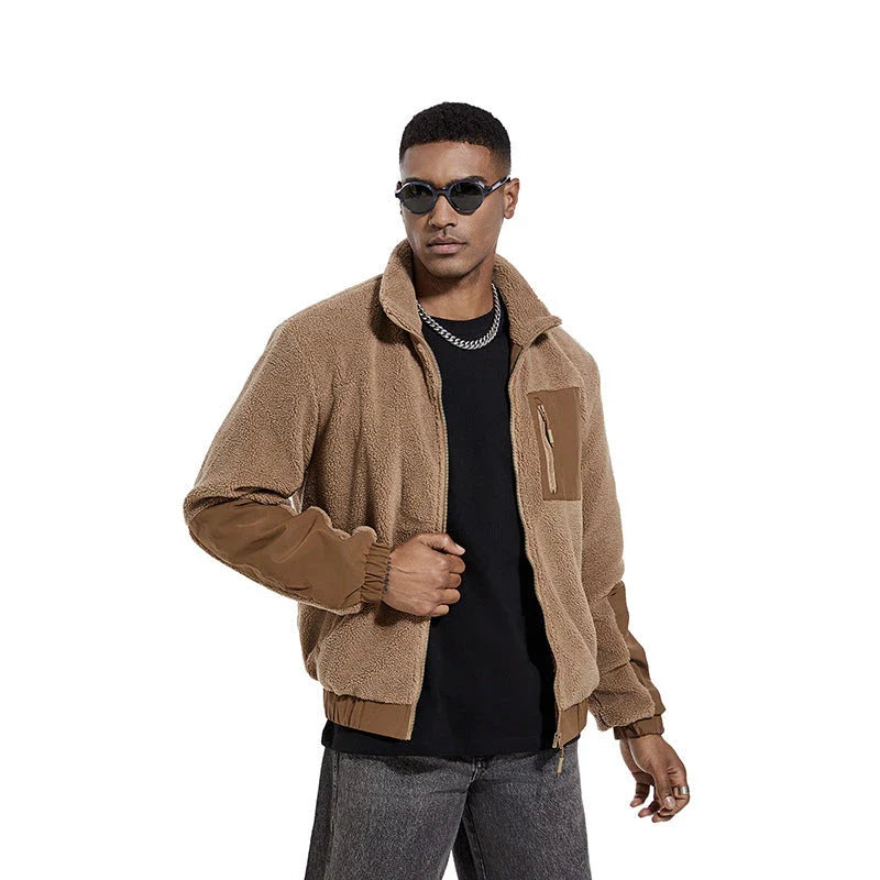 A cozy and stylish men's fleece jacket with a standing collar and convenient side pockets, available in a range of classic colors.