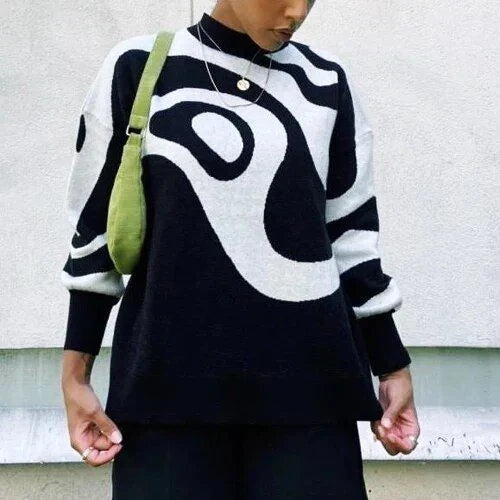 A woman wearing a stylish, striped turtleneck oversized sweater in a relaxed, comfortable fit.