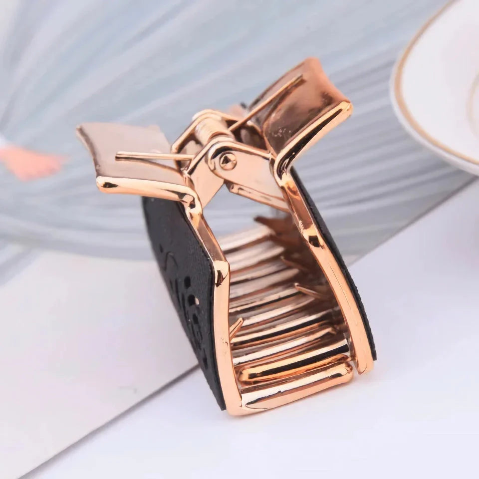 Elegant floral hair claw accessory for women, featuring a premium canvas and rubber design in a stylish brown color