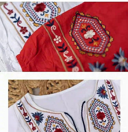 Elegant embroidered cotton-linen dress with tassels, featuring a waist-cinching A-line silhouette in vibrant colors