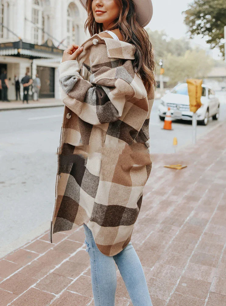 A fashionable women's plaid woolen jacket with a relaxed fit, featuring a timeless plaid pattern and polyester construction for comfort and durability.