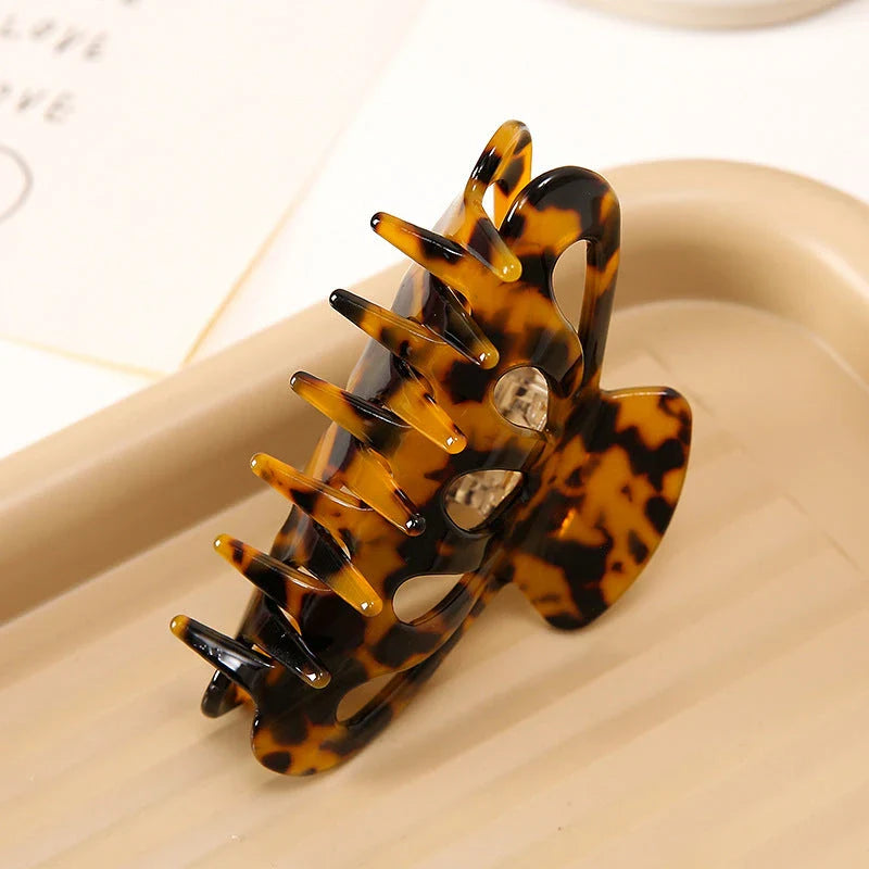 Stylish geometric hollow stripes hair barrettes in beige color, a fashionable accessory to elevate any hairstyle