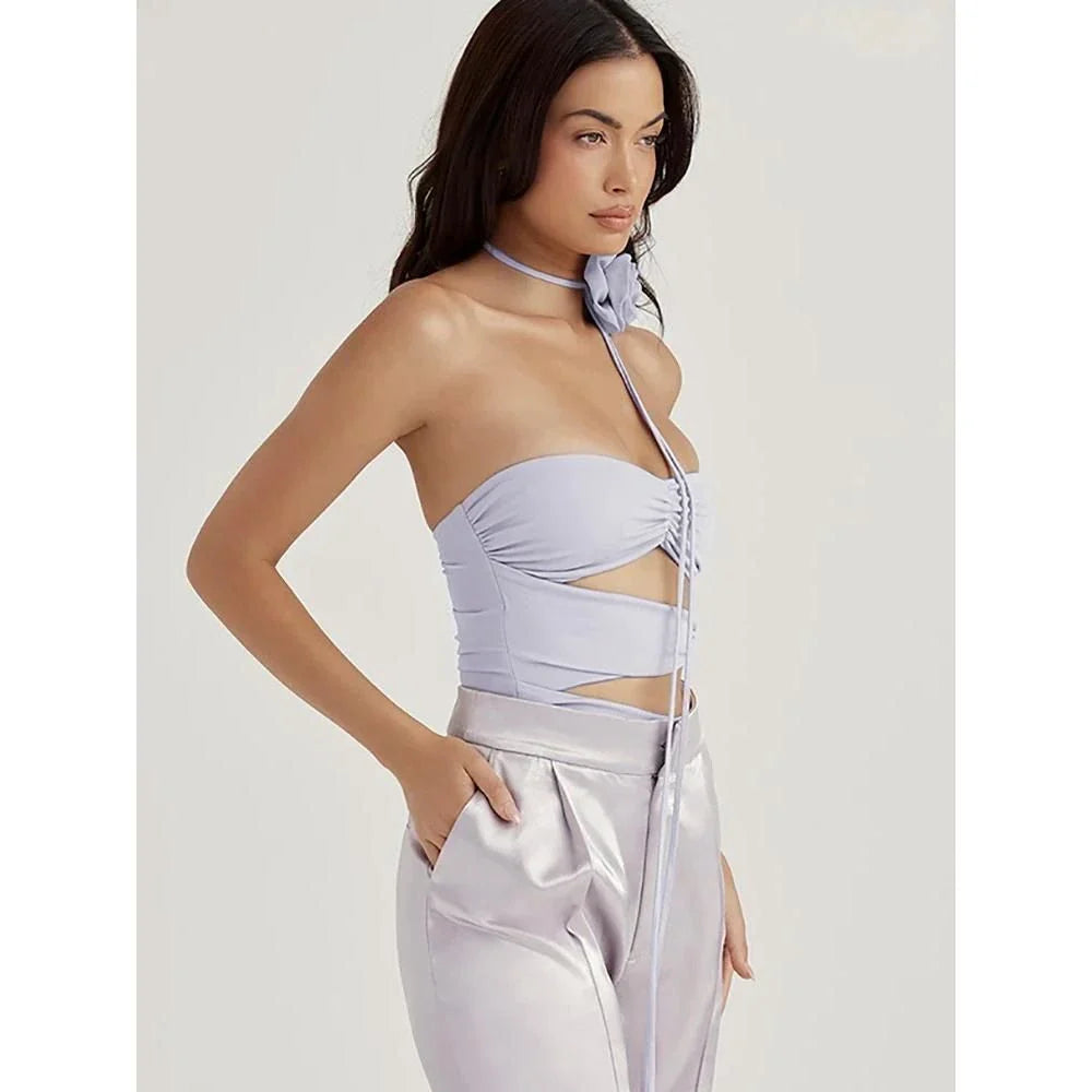 Purple off-shoulder ruched bodysuit with a unique hollow-out design and necklace accent, offering a captivating look and comfortable fit.