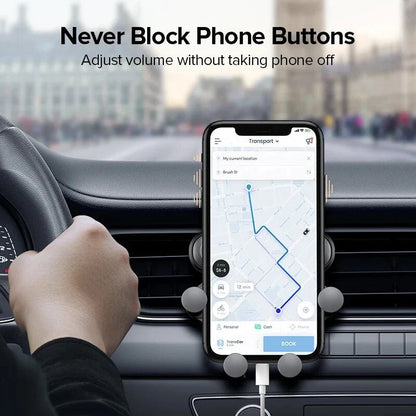 Gravity-powered car phone holder with air vent mount, securely holding a smartphone in place