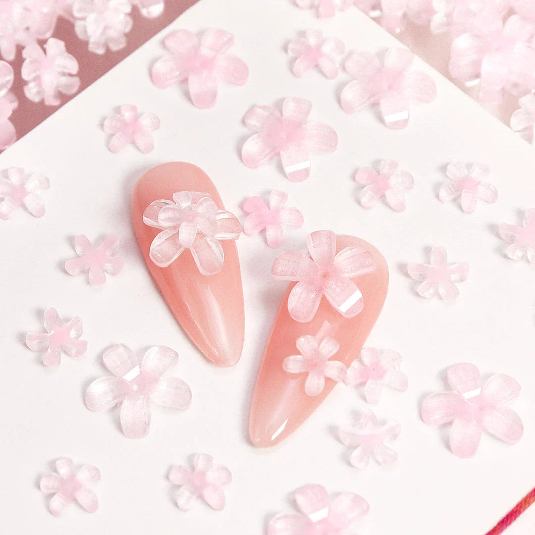 Transparent jelly 3D flower nail charms with rhinestone accents for elegant and charming nail art designs