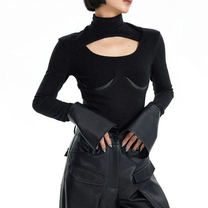 Stylish knit pullover with PU leather patchwork detail, offering a cozy and fashionable winter essential