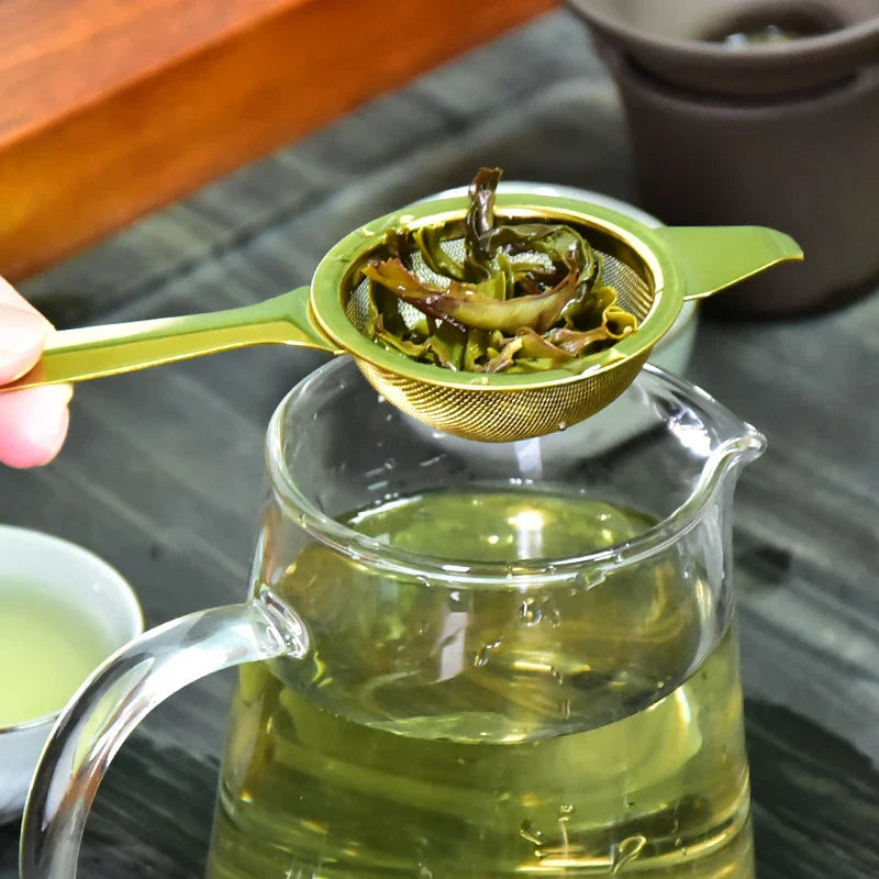 Elegant stainless steel tea strainers with a sleek, minimalist design for effortless brewing and a refined tea experience.