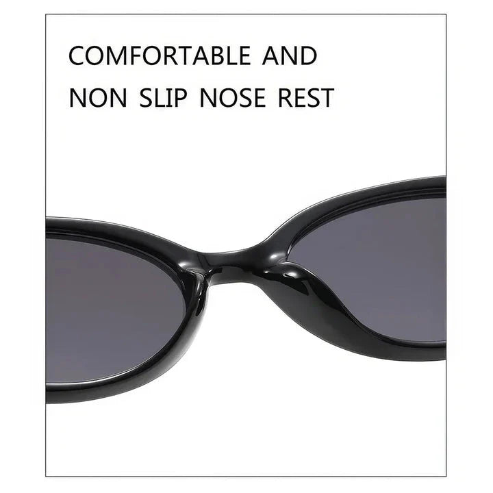 Chic oval sunglasses with white grey acetate frames and polycarbonate lenses, designed for fashionable women to shield their eyes from UV rays in style.