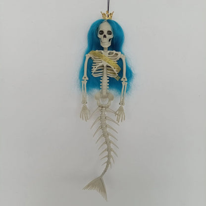 Mermaid bone pendant in various colors, including brown, dark purple, burgundy, and lake blue, hanging outdoors for Halloween decoration