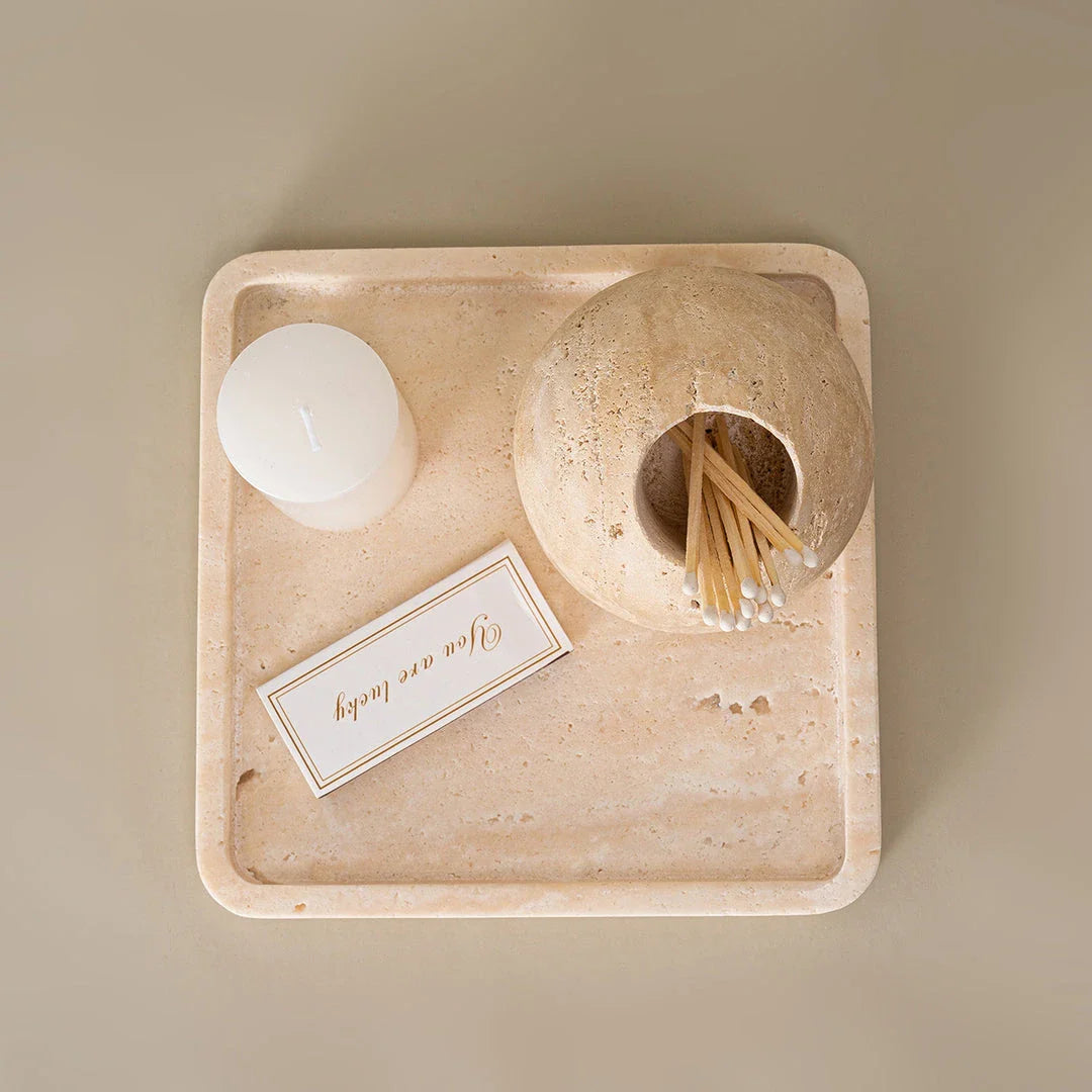 Elegant beige travertine stone match holder and toothpick jar with vintage design, perfect for home decor
