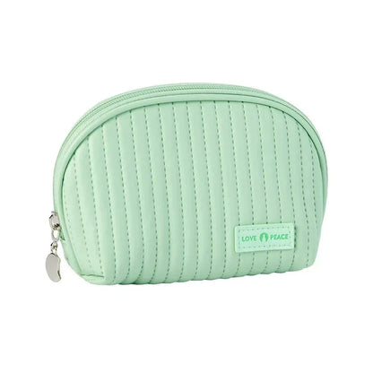 Stylish compact makeup bag made of premium PU leather in light blue color, with a sleek minimalist design for modern women