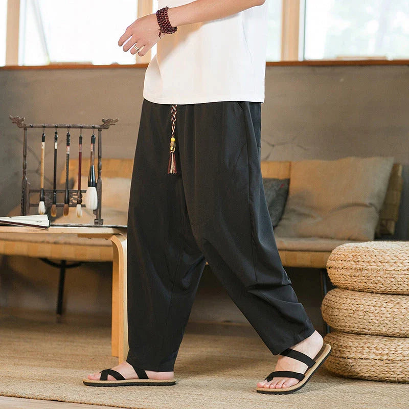 Men's Chinese-inspired harem pants made of luxurious ice silk fabric with a relaxed, draped silhouette