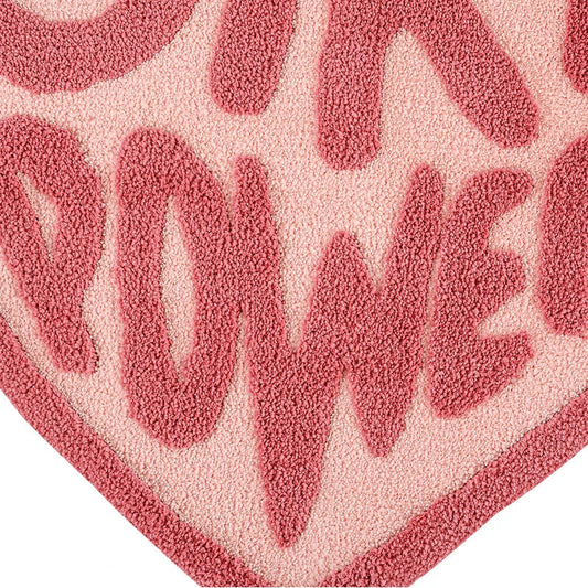 Cozy pink heart-shaped tufted rug with 'GRL PWR' message, perfect for girls' rooms, dressing rooms, and bathrooms