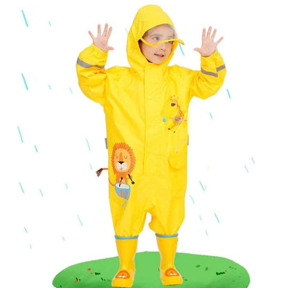 Children in a colorful dinosaur-themed waterproof rain jumpsuit playing outdoors in the rain