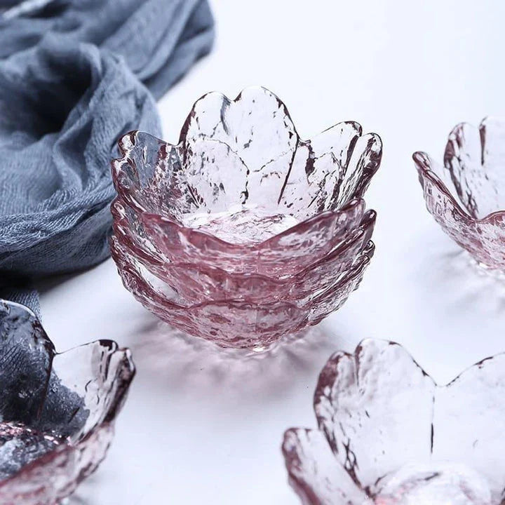 Handcrafted flower-shaped glass salad bowl in vibrant pink color, perfect for serving fresh greens, fruits, and more.