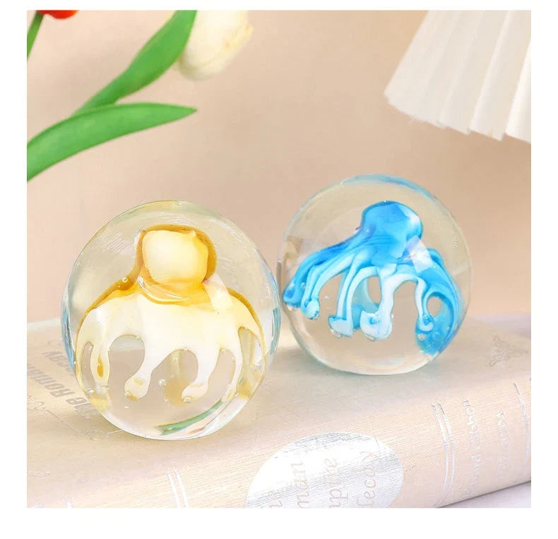 Handcrafted glass octopus decoration for windshield washer fluid, available in ocean blue and tea brown colors