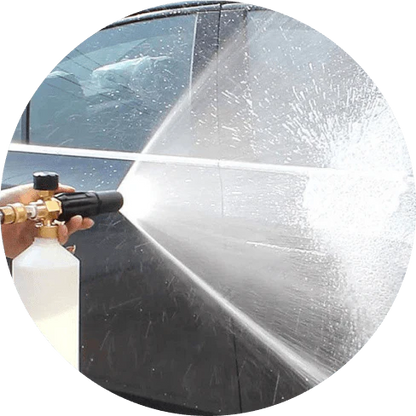 A compact, plastic car wash foam-generating tank with a copper connector to attach to a standard garden hose.