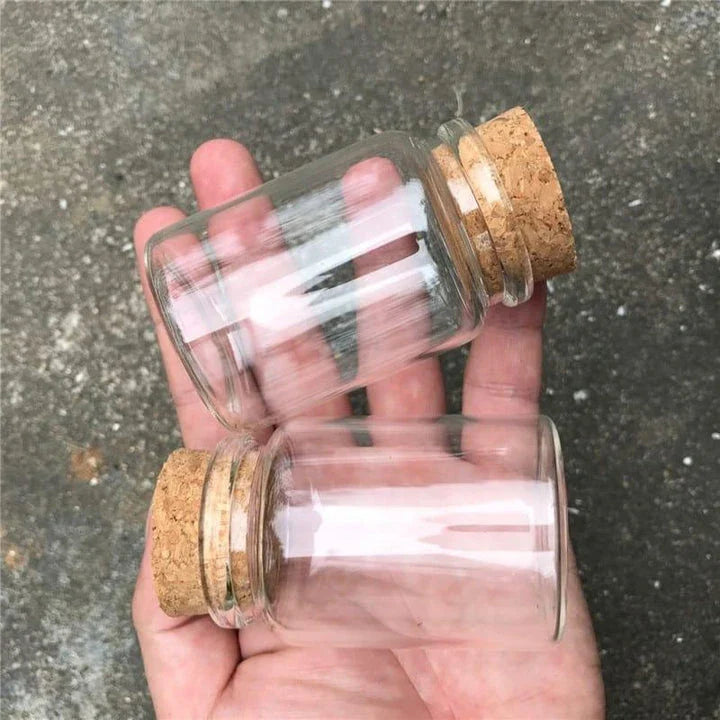 Premium glass spice jar with cork lid for organizing and storing spices, herbs, and seasonings in a modern, minimalist kitchen