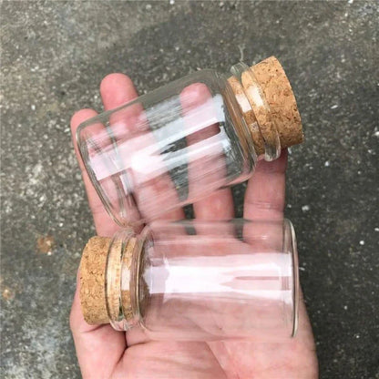 Premium glass spice jar with cork lid for organizing and storing spices, herbs, and seasonings in a modern, minimalist kitchen