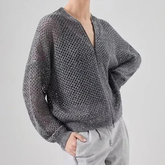 A stylish, sequin-embellished linen blend knit top with a flattering slim fit and sophisticated design.
