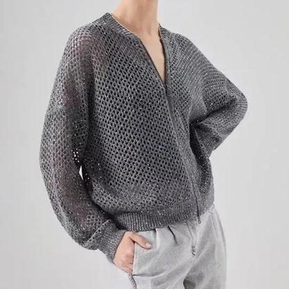 A stylish, sequin-embellished linen blend knit top with a flattering slim fit and sophisticated design.