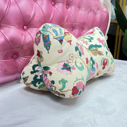 Multifunctional sofa cushion with vibrant cartoon-inspired designs, including flowers, plants, and cloud patterns, adding a playful touch to any living space.