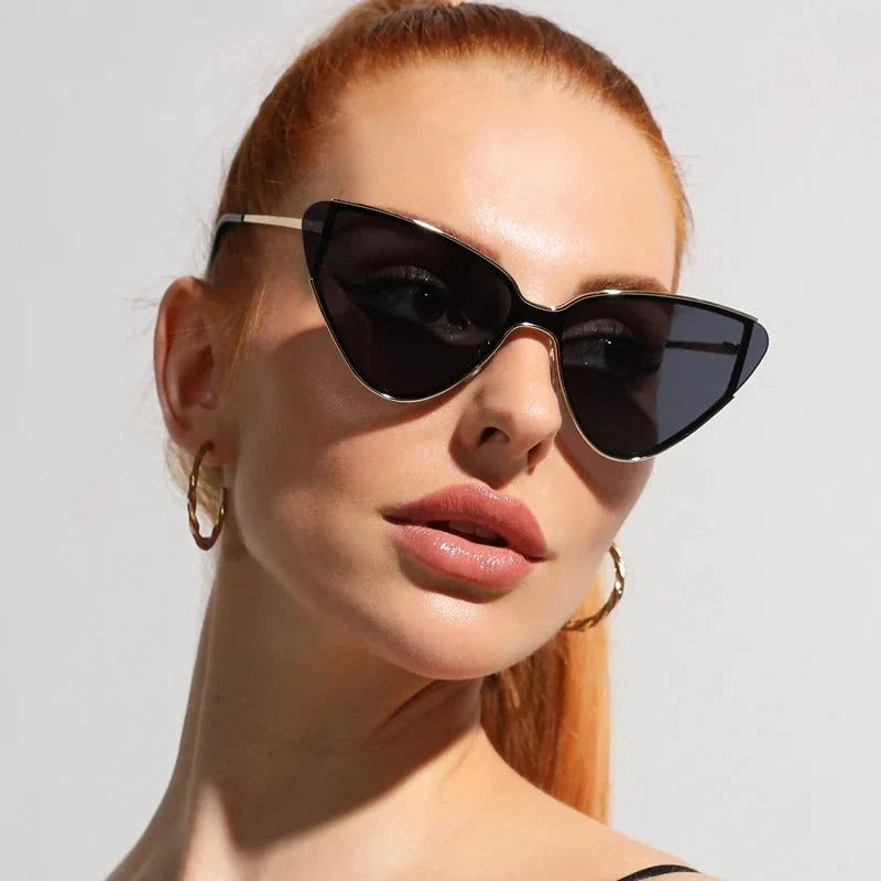 Fashionable steampunk-inspired cat eye sunglasses with gradient lenses and UV400 protection for men and women