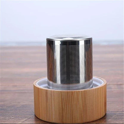 Premium glass water bottle with stainless steel tea infuser in bamboo color