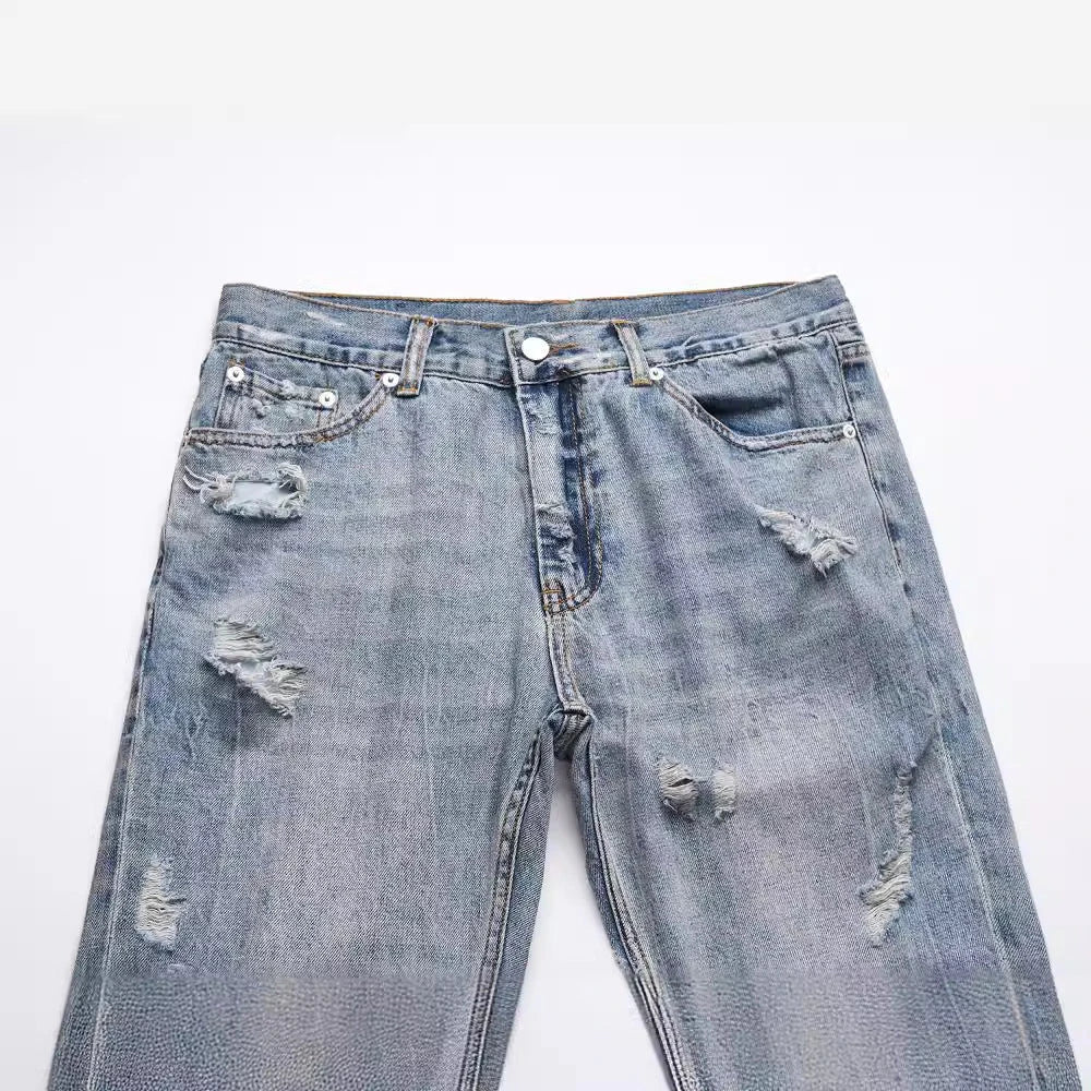 Premium distressed denim jeans with ripped detailing, perfect for casual streetwear style
