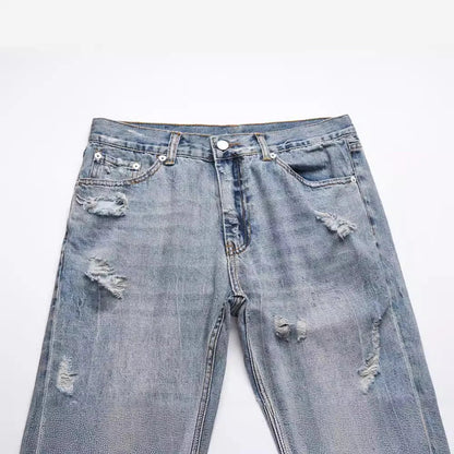 Premium distressed denim jeans with ripped detailing, perfect for casual streetwear style